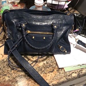 Balenciaga navy small. Selling 865.